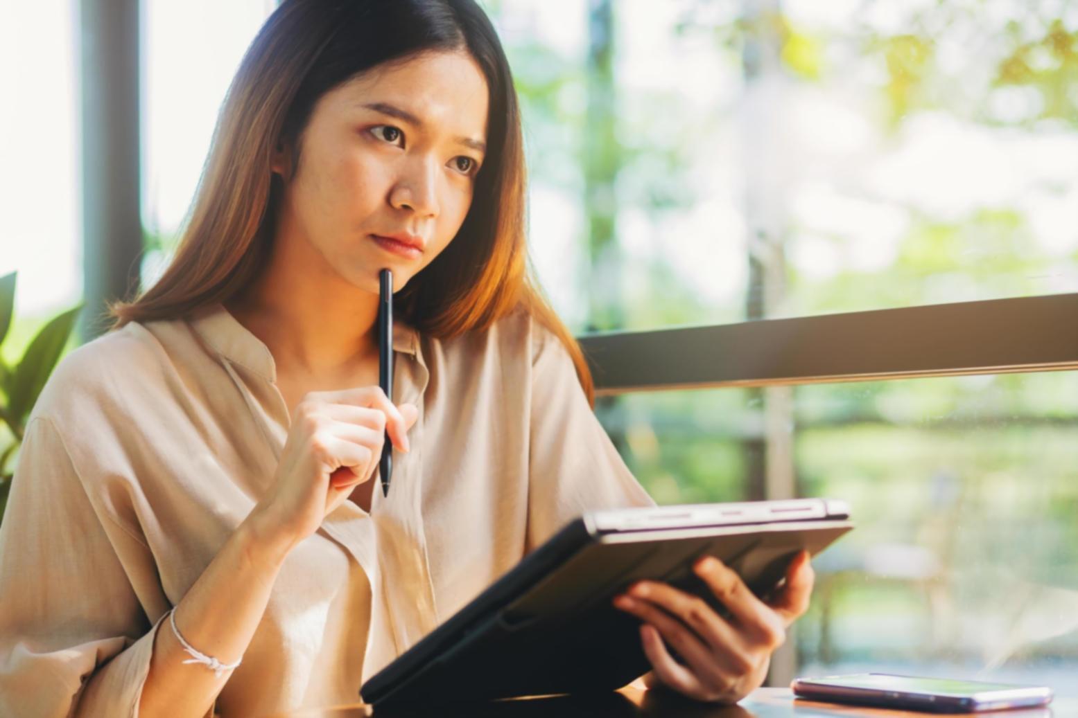 Developers participating in hands-on software security training workshop with laptops and collaborative learning environment